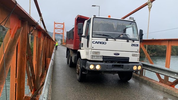 A three-axle load truck on the Rosselot Bridge.