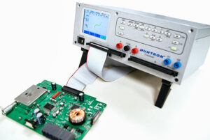 How to use a Tracker 3200S to test a PCB Connector. Image shows Tracker 3200S with Cable and PCB Board being scanned